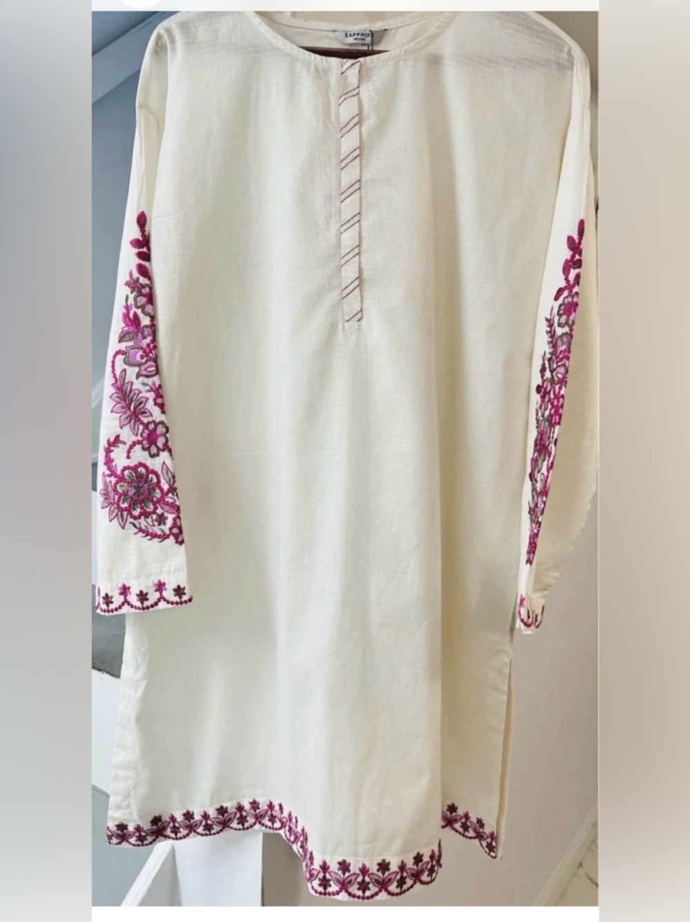 Pakistani embroidered dobby lown shirt.